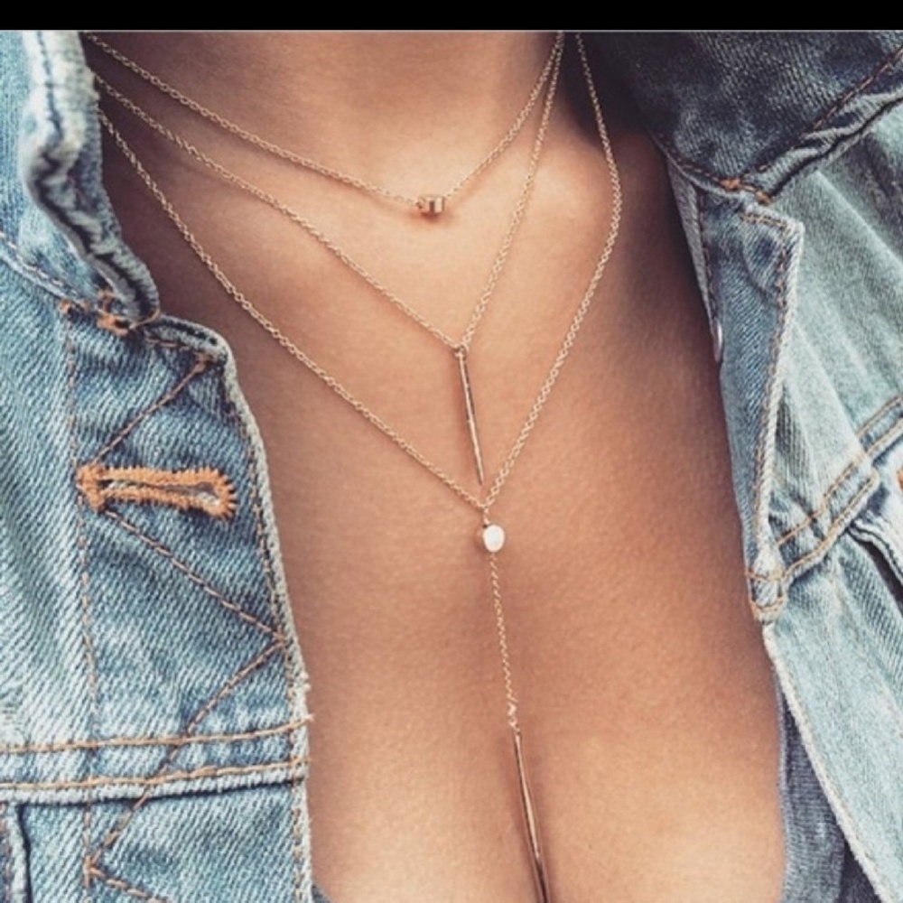 Triple chain gold or silver tone necklace.